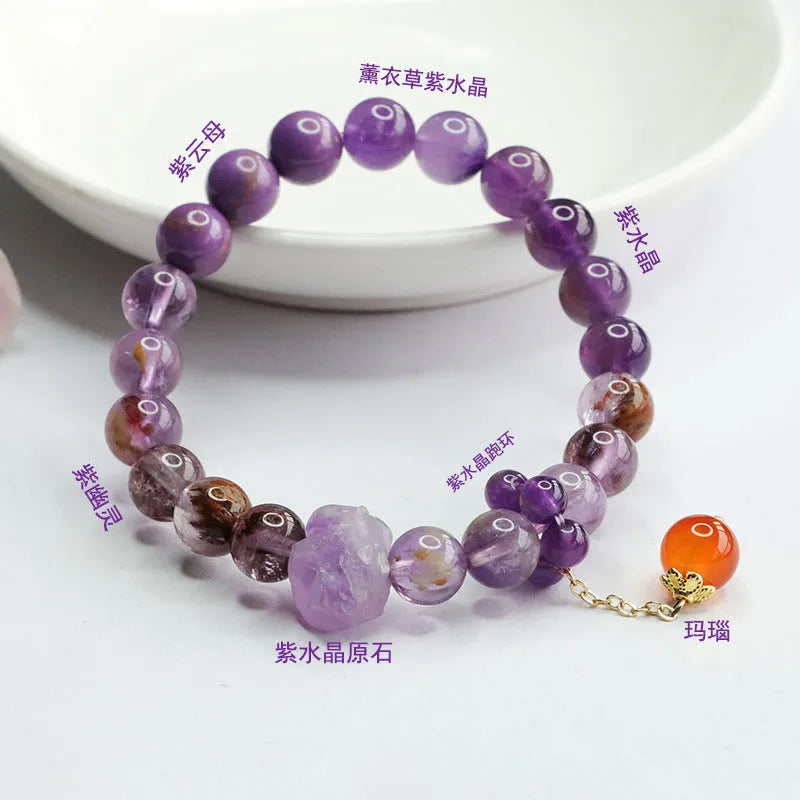 Adjustable nine purple amethyst and red agate Mori-style crystal bracelet showing 8mm beads and organic stone arrangement