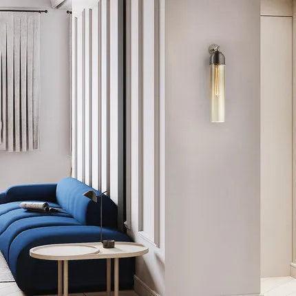 Nordic postmodern glass wall lamp in a modern living room setting, showing amber glass shade.