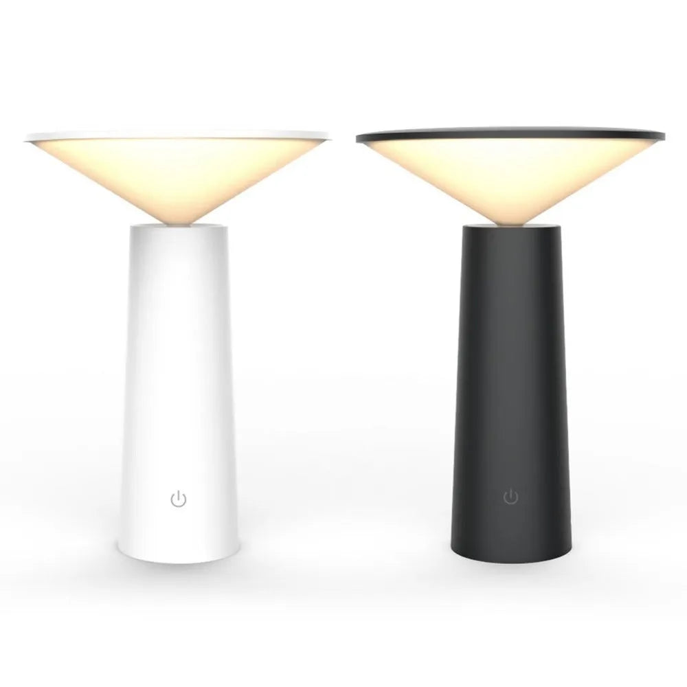 Black USB desk lamp with touch sensor and adjustable head on a wooden table