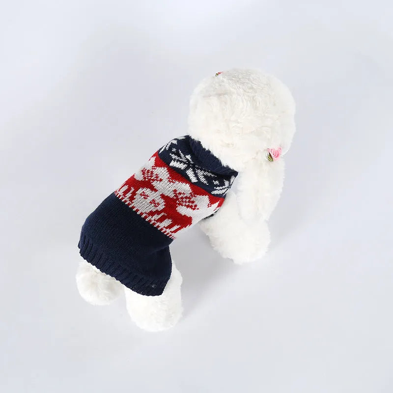 Navy blue knitted dog sweater with Christmas design, sizes XS to L, made from acrylic material.