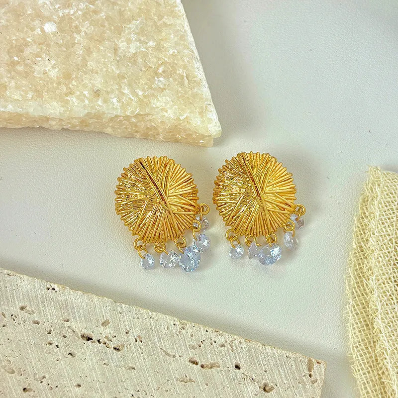Gold geometric round earrings with electroplated metal construction for women
