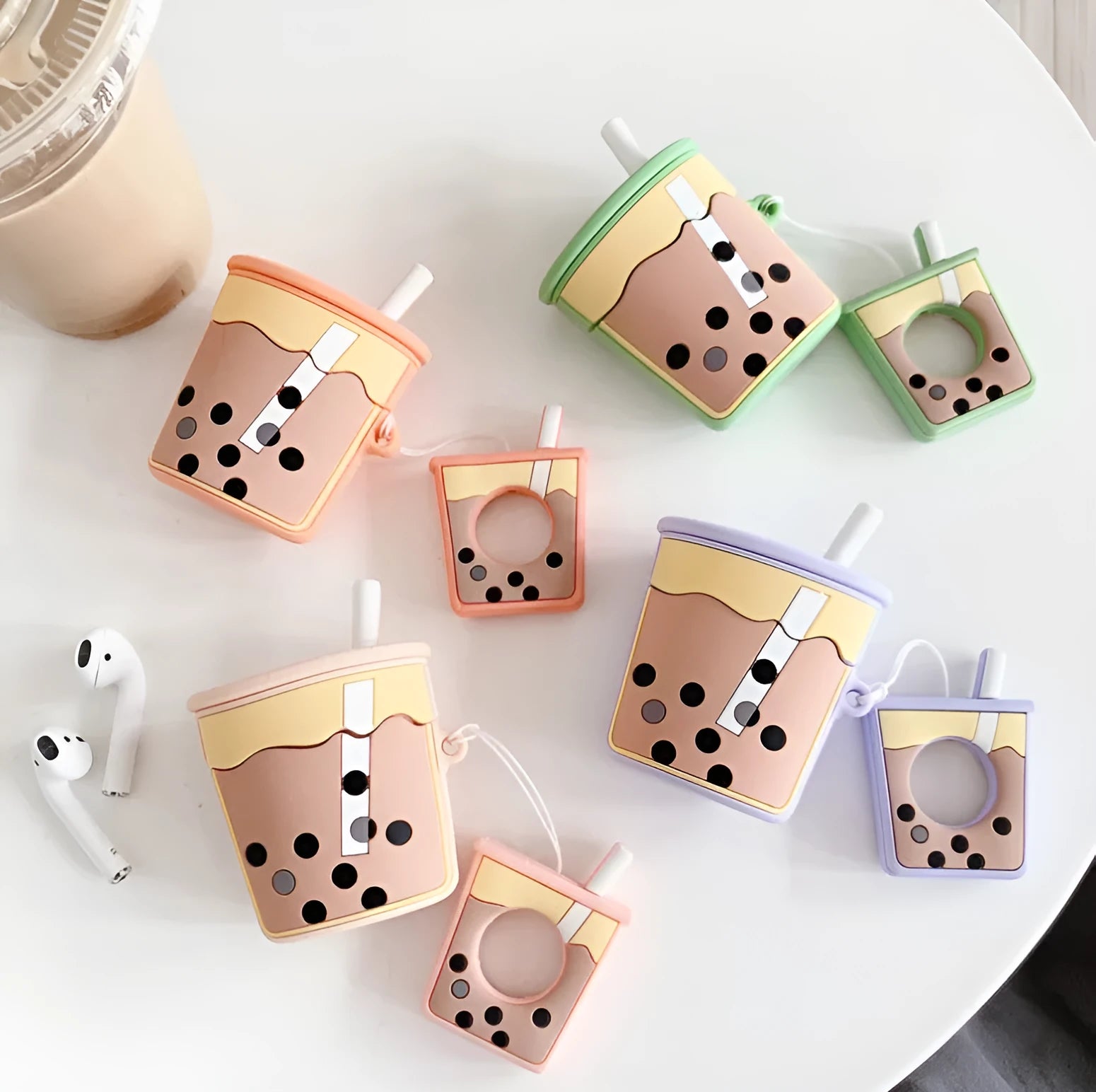 Silicone AirPods earphone covers in green, orange, pink, purple colours
