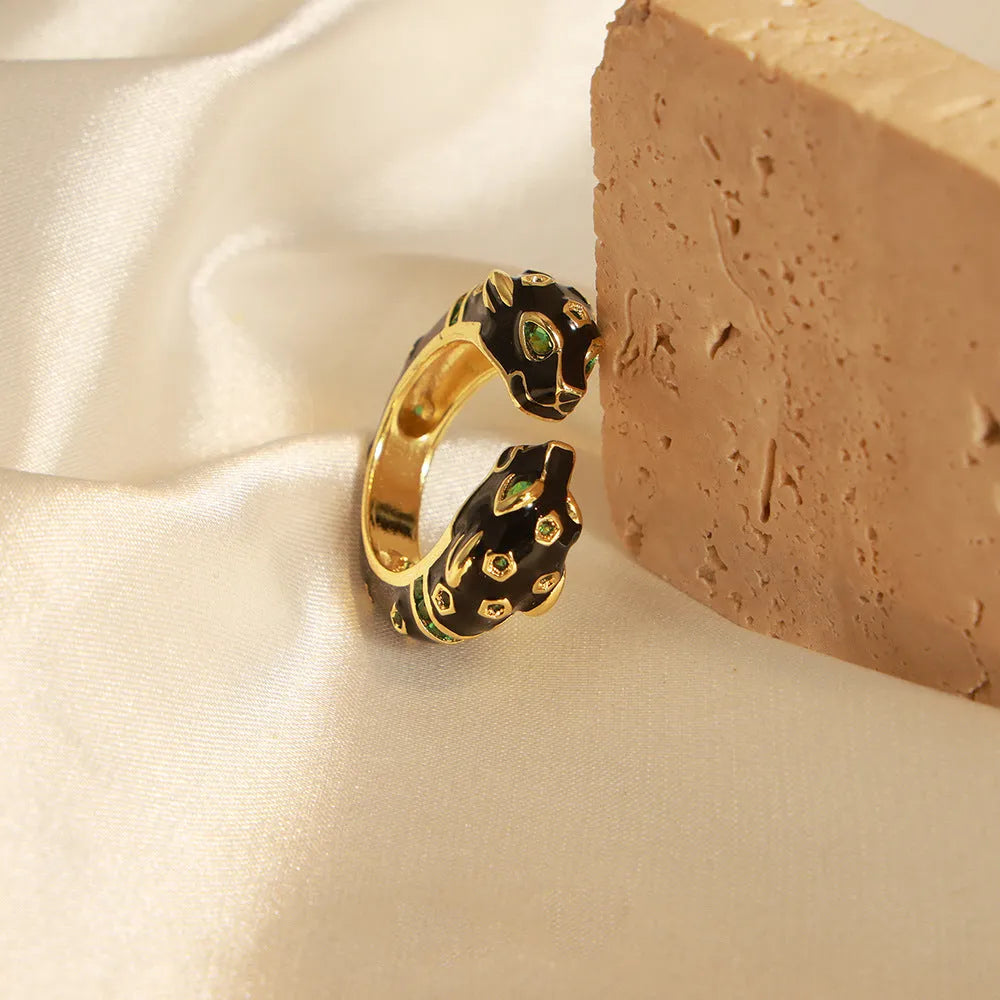 Geometric open ring with black cheetah pattern, copper construction, UK size 7 women's jewellery