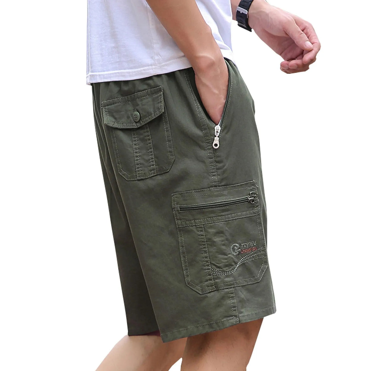 Men's loose fit straight leg cotton trousers in light grey on a hanger