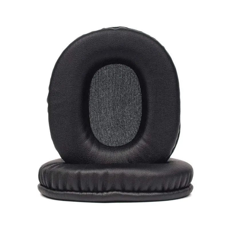 Black soft PU leather headphone covers for Sony 1R, shown on headphones in a home setting.