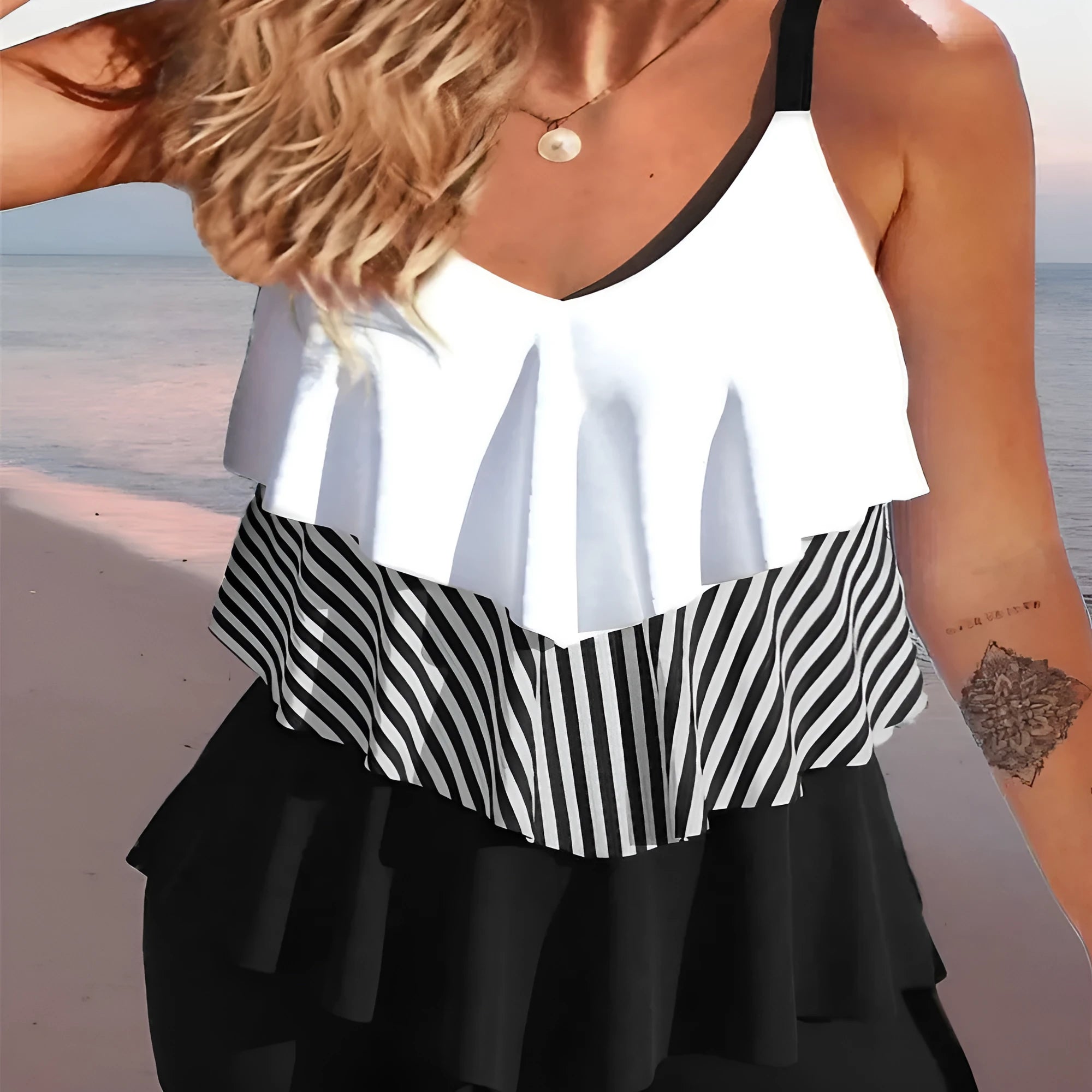 Women's backless spaghetti-strap ruffle bikini swimsuit top and shorts in a floral pattern.