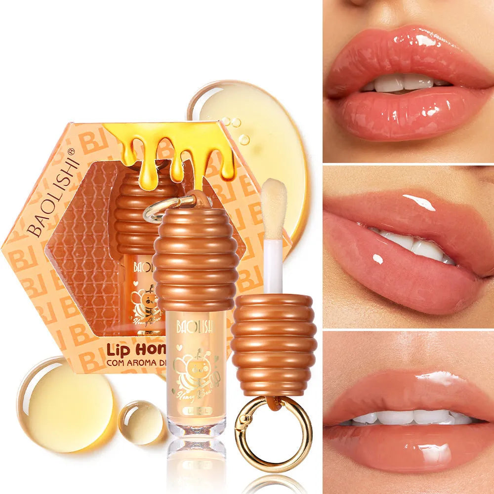 Portable honey lip gloss attached to keychain with moisturising properties