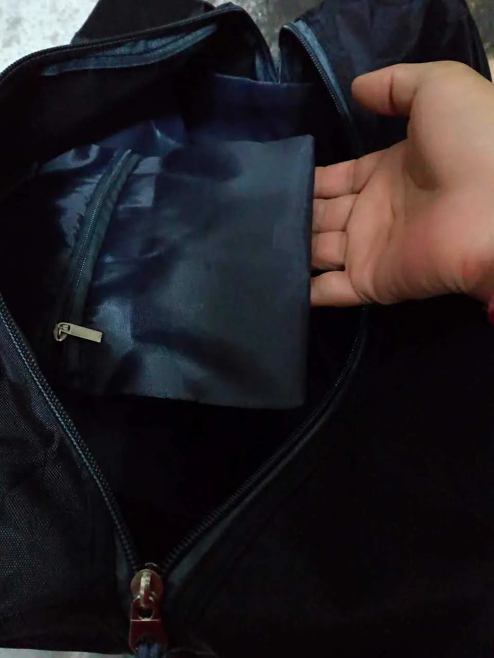 Waterproof nylon yoga and gym bag in black, shown in medium and large sizes.
