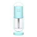 Pink USB portable air humidifier with projection night light on a wooden desk
