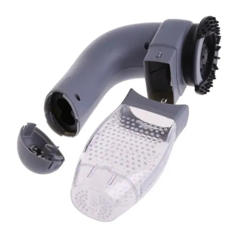 Grey portable pet hair vacuum cleaner and massage brush for dog and cat grooming on sofa