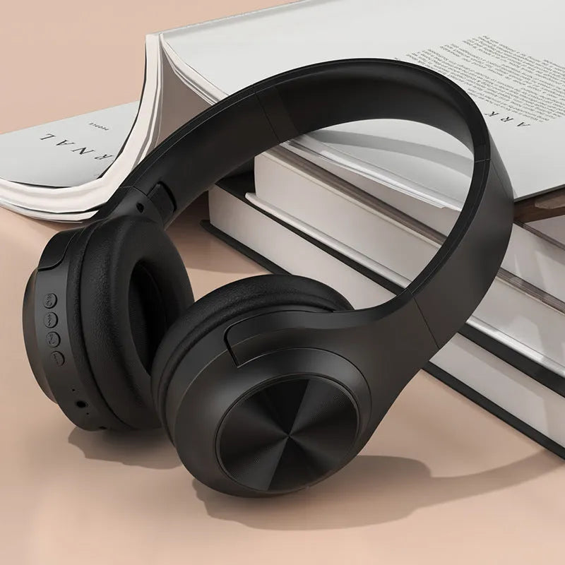 Wireless Bluetooth headset with creative design in ivory white colour, showing head-mounted wearing style