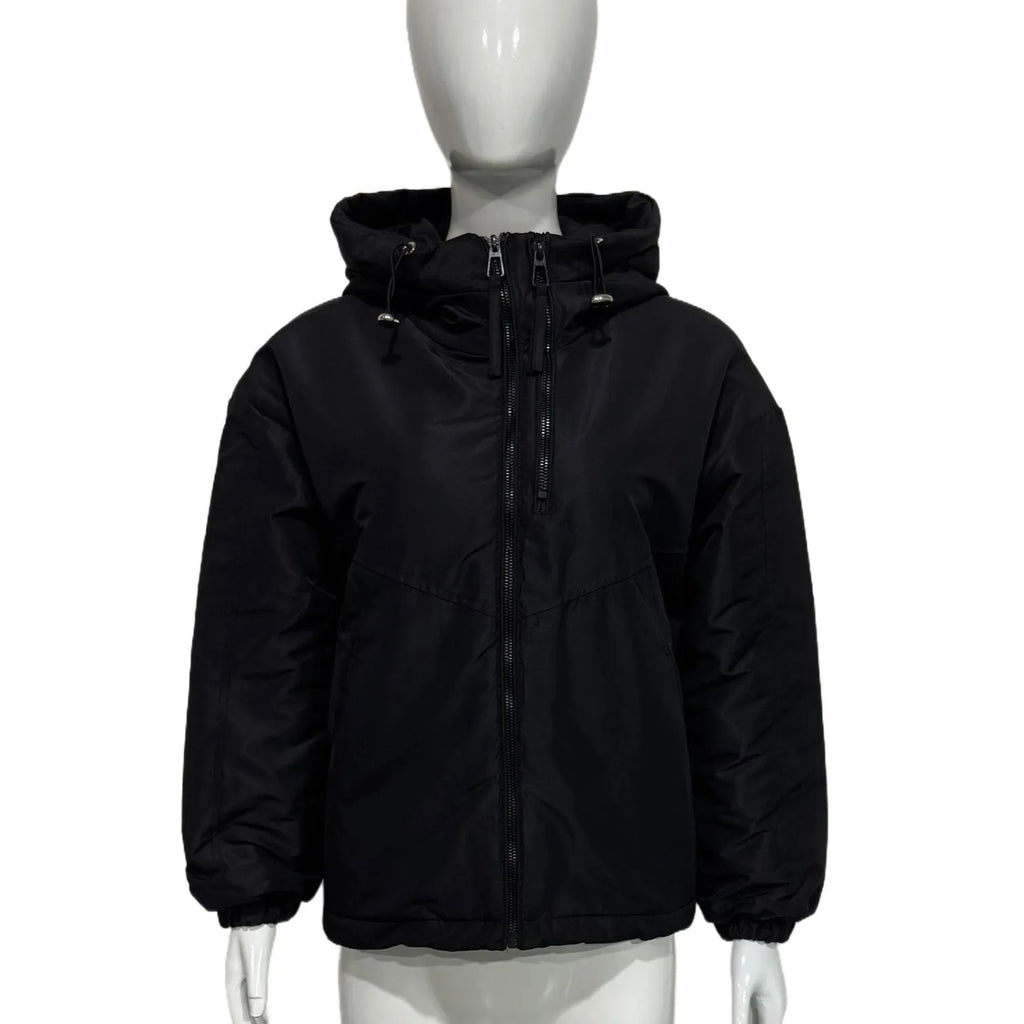 Women's loose-fit hooded shell jacket in grey shown from the front, with long sleeves and a zip front.
