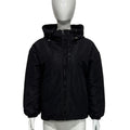 Women's loose-fit hooded shell jacket in grey shown from the front, with long sleeves and a zip front.