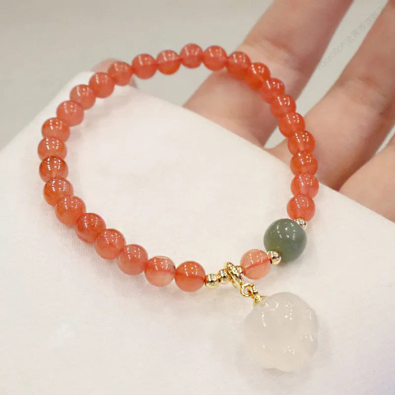 Women's natural red agate and jade bracelet set with cat paw detail on 8mm beads