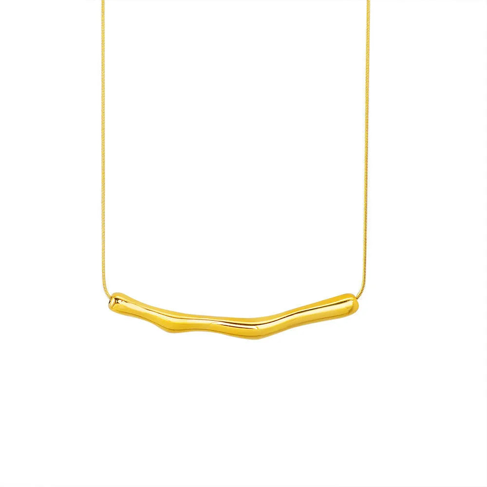 Close-up of a women's titanium steel necklace with an irregular pleated texture, shown in a gold tone finish.
