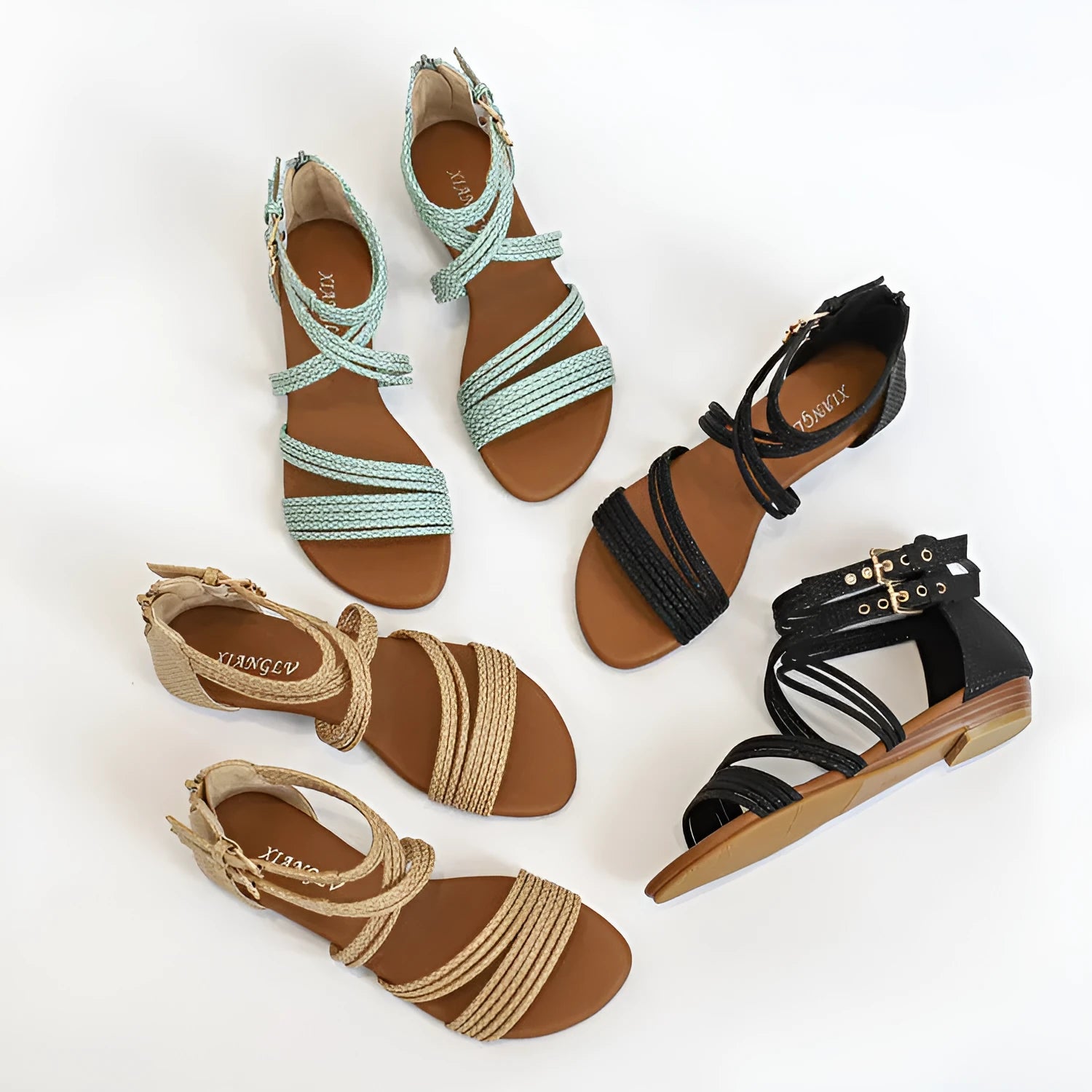 Women's open toe Roman sandals with cross straps, buckle, thick rubber sole, and a back zipper in light green.