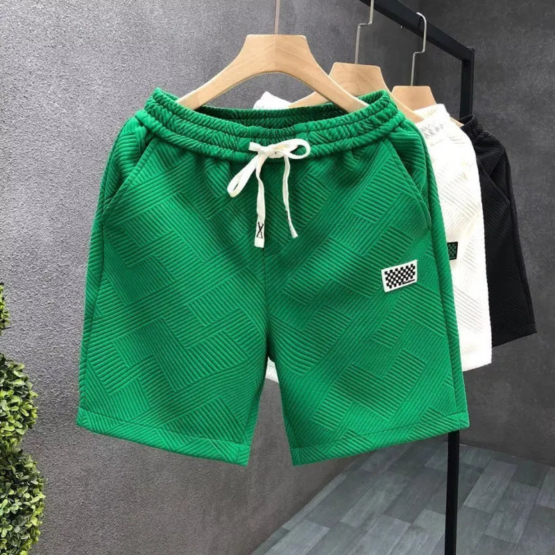 Casual sports shorts in solid colour with elastic waistband, suitable for active wear
