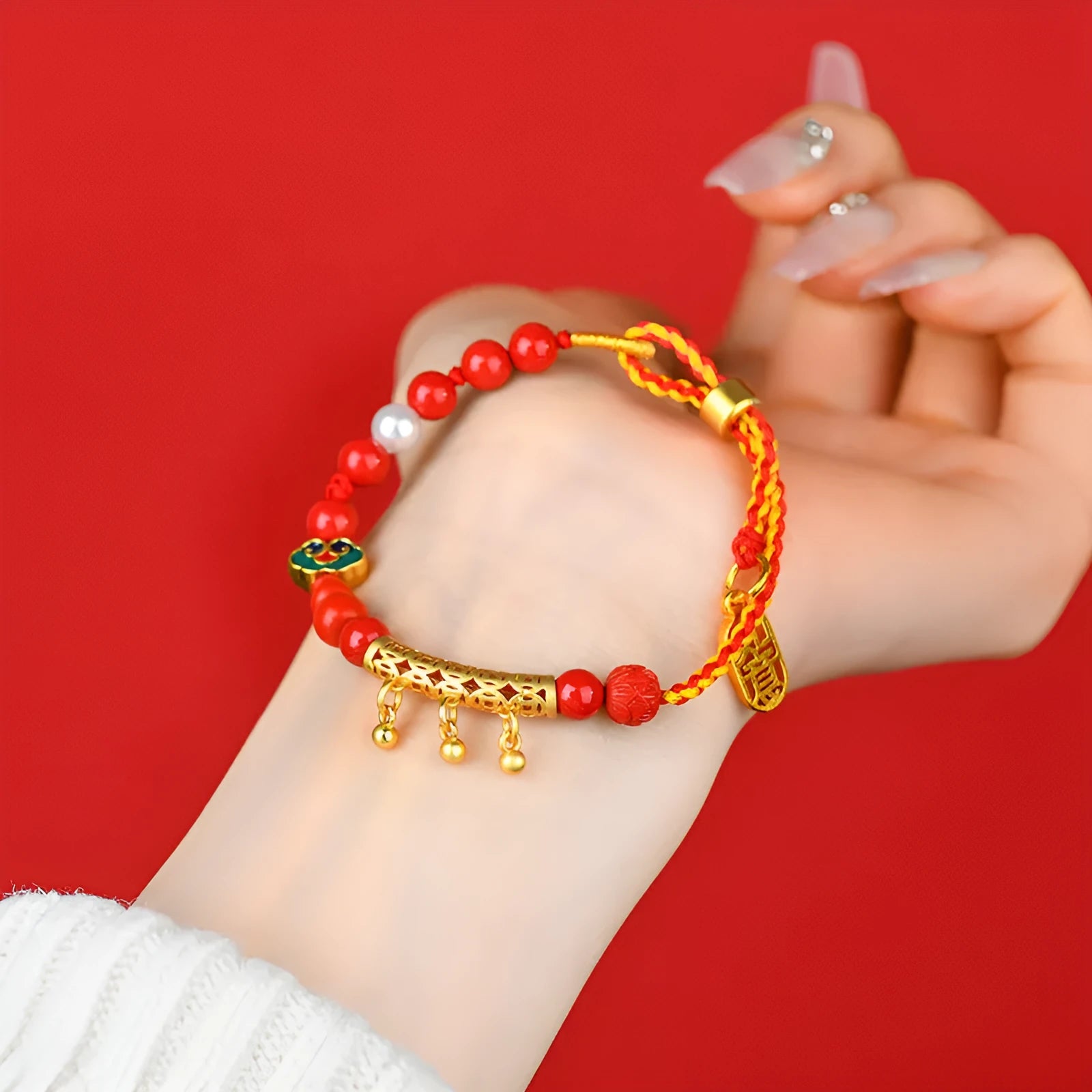 Red rope woven bracelet with round cinnabar charm and small bell for women