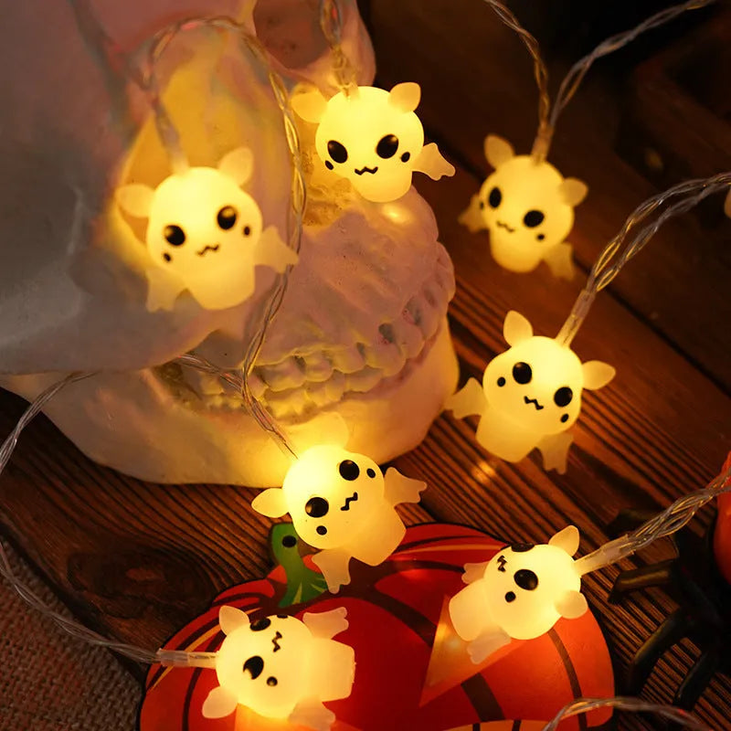 Halloween LED string lights with pumpkin, ghost and bat shaped covers, battery operated, PVC shell, warm white.