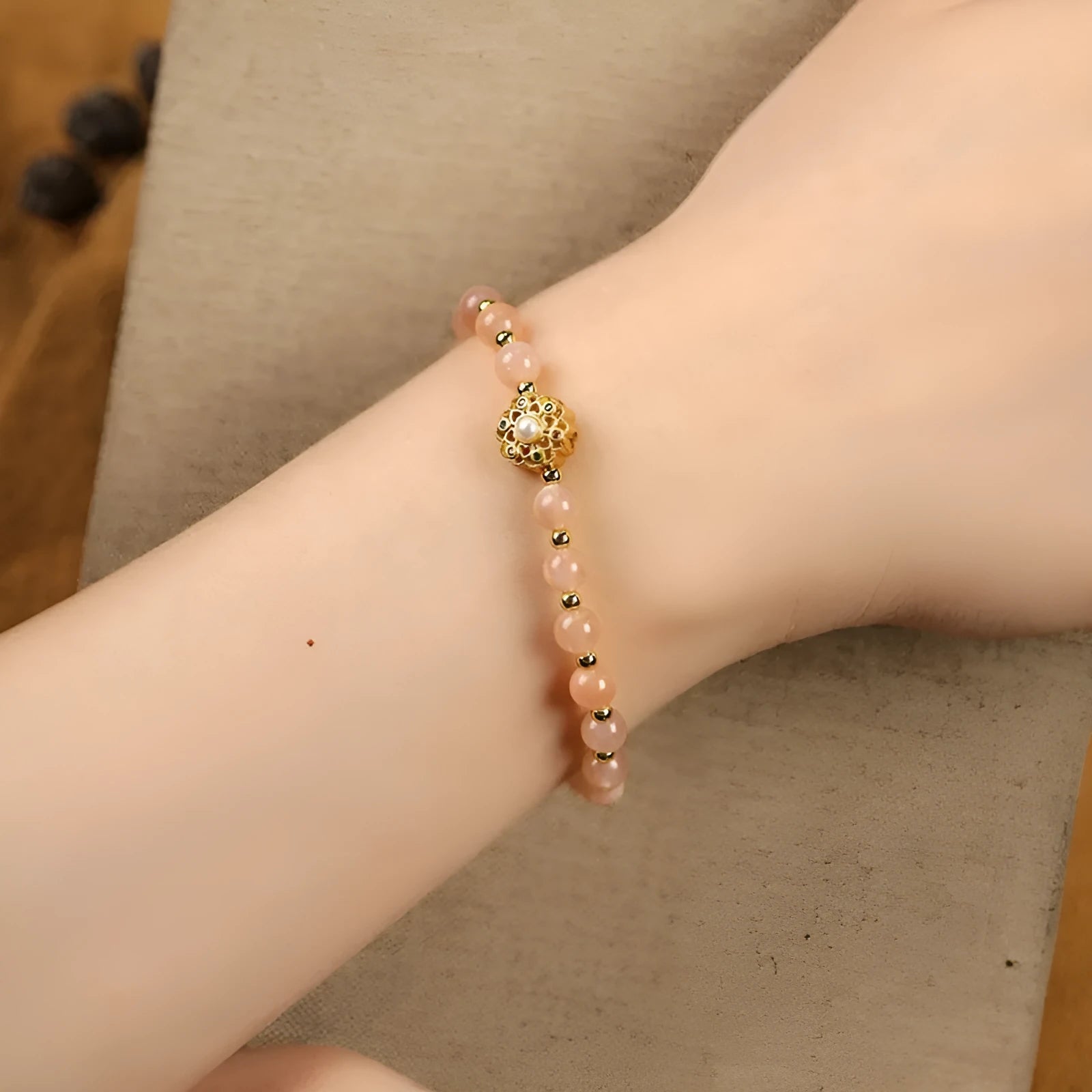 Hand-woven crystal bracelet with grey moonstone, pink sunstone, and peach strawberry quartz 6mm beads