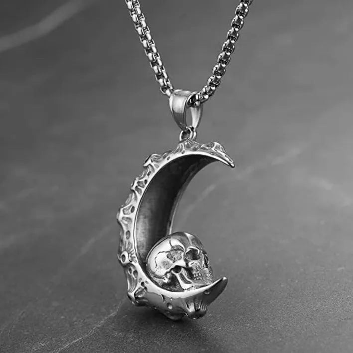 Men's silver alloy skull pendant necklace on a chain, showing design options like dagger, moon, and grimace.