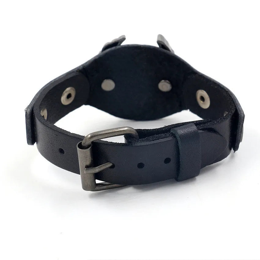 Black geometric leather bracelet with alloy eagle watch-button closure, showing 26cm length and 1.7-3.8cm width variation
