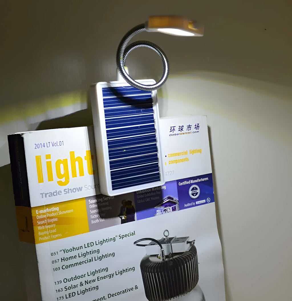 Solar garden lamp with plastic shade and LED light for outdoor use