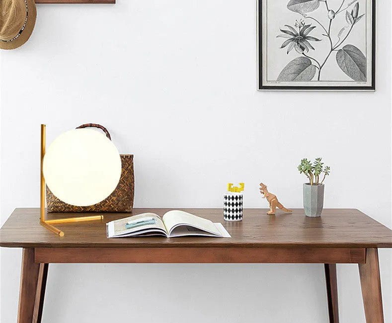 Creative LED table lamp with glass shade in one of three style sizes, showing push button for three-tone light control.