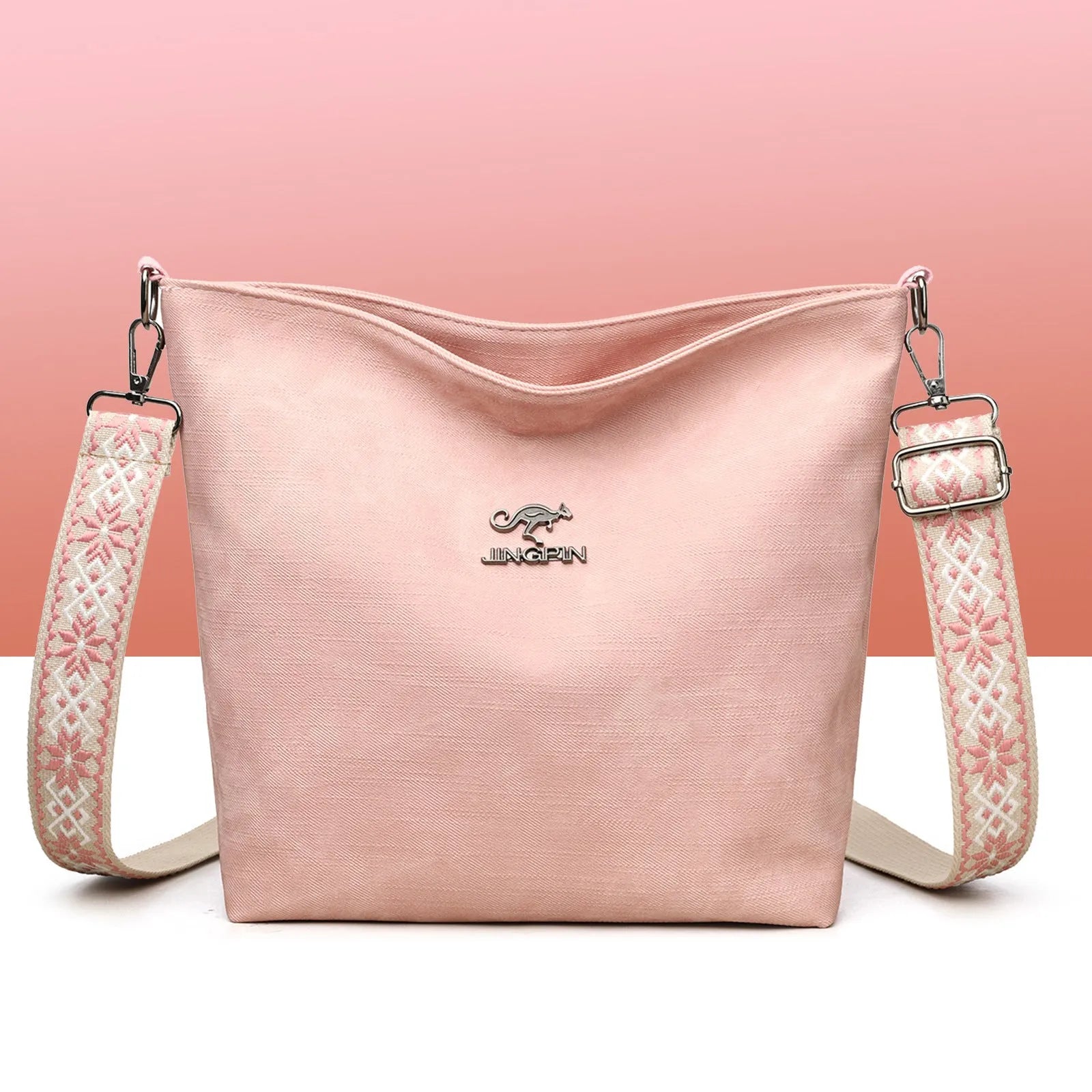 Soft PU large capacity crossbody bag in pink, grey, or yellow with an adjustable shoulder strap.