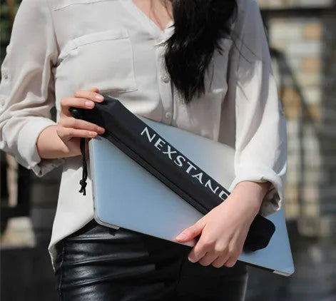 Black folding portable laptop stand with reinforced nylon construction, shown in both extended and collapsed positions