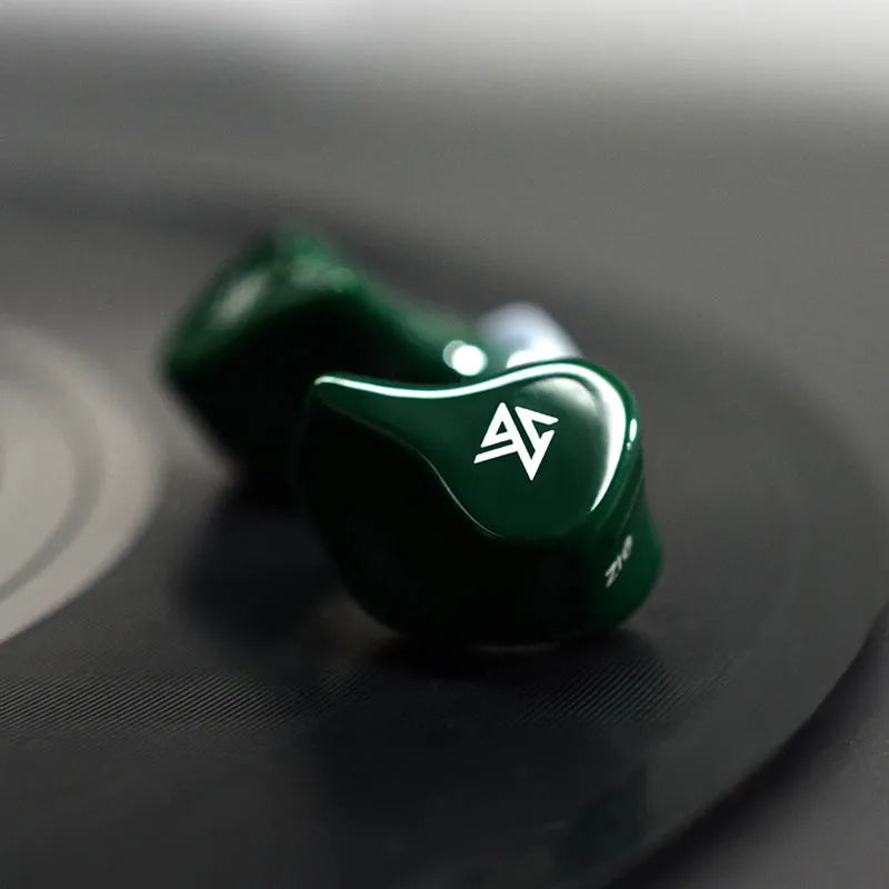 Z1 black and green true wireless Bluetooth earbuds with in-ear design and charging case