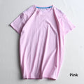 Men's solid colour combed cotton round neck T-shirt on a hanger.