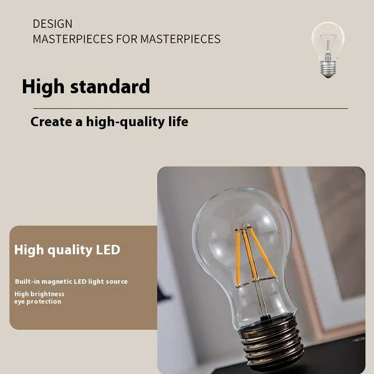 Suspension bulb small night lamp with 11cm square base and iron art body on wooden desk