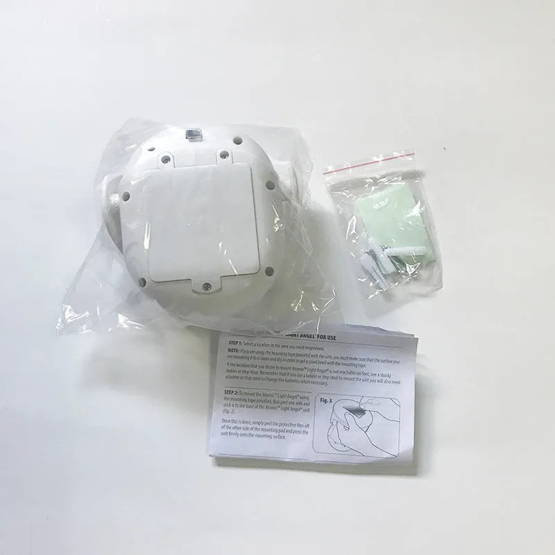 White Atomic Angel induction light with ABS plastic housing, showing dimensions.