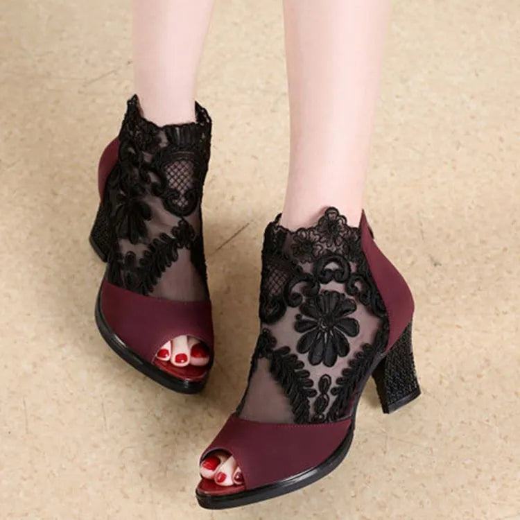Lucyever women's gladiator sandals with square heel, lace upper, flower pattern, and zip closure in black colour