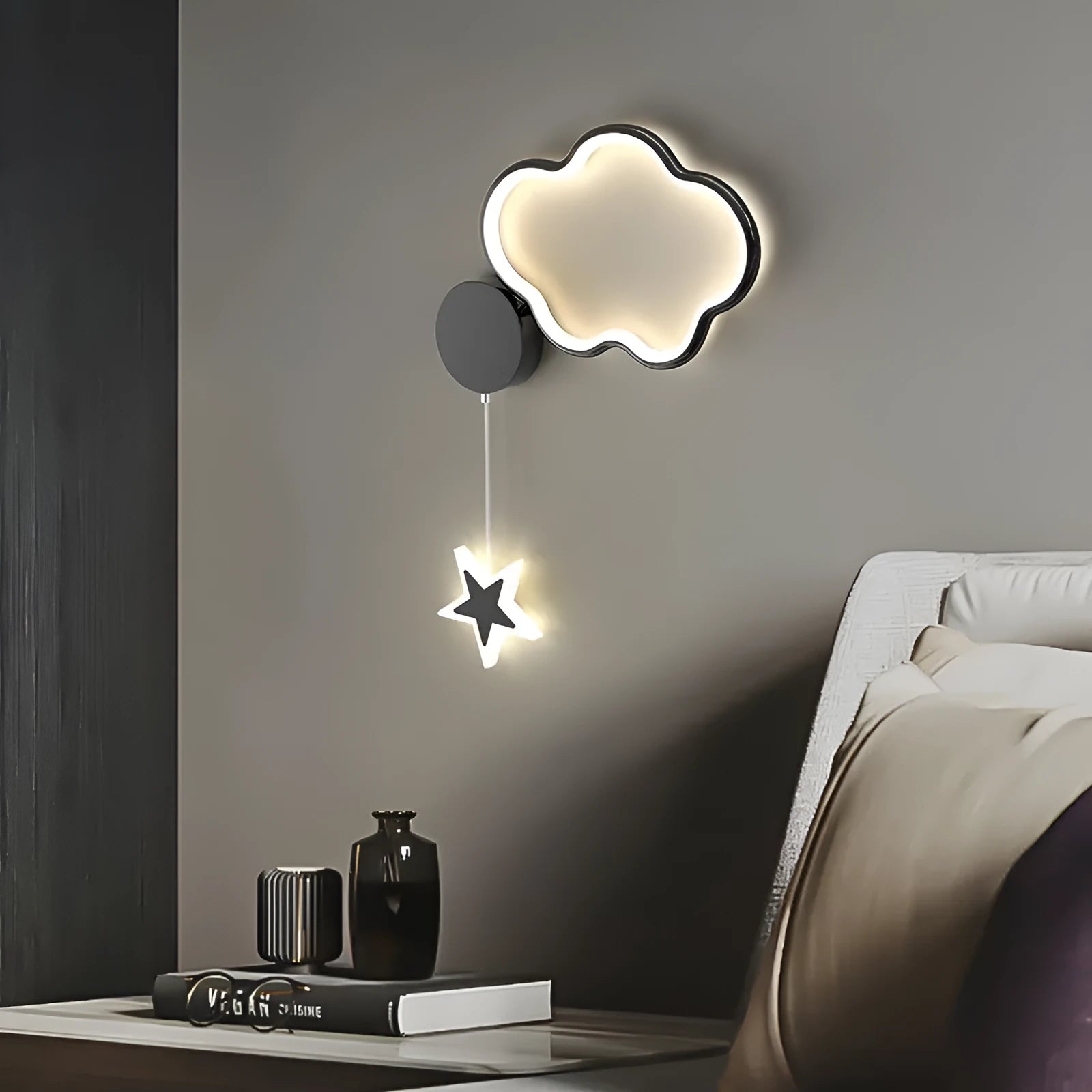 Five-pointed star shaped children's bedside wall lamp with cloud and star motifs in black finish