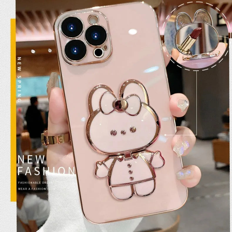 Cartoon rabbit stand mirror phone case for Apple iPhone, TPU electroplated anti-fall cover, pink bracket