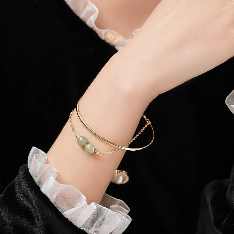 Hetian jade bracelet with gold-inlay treatment in single, double, or three-bead versions for women
