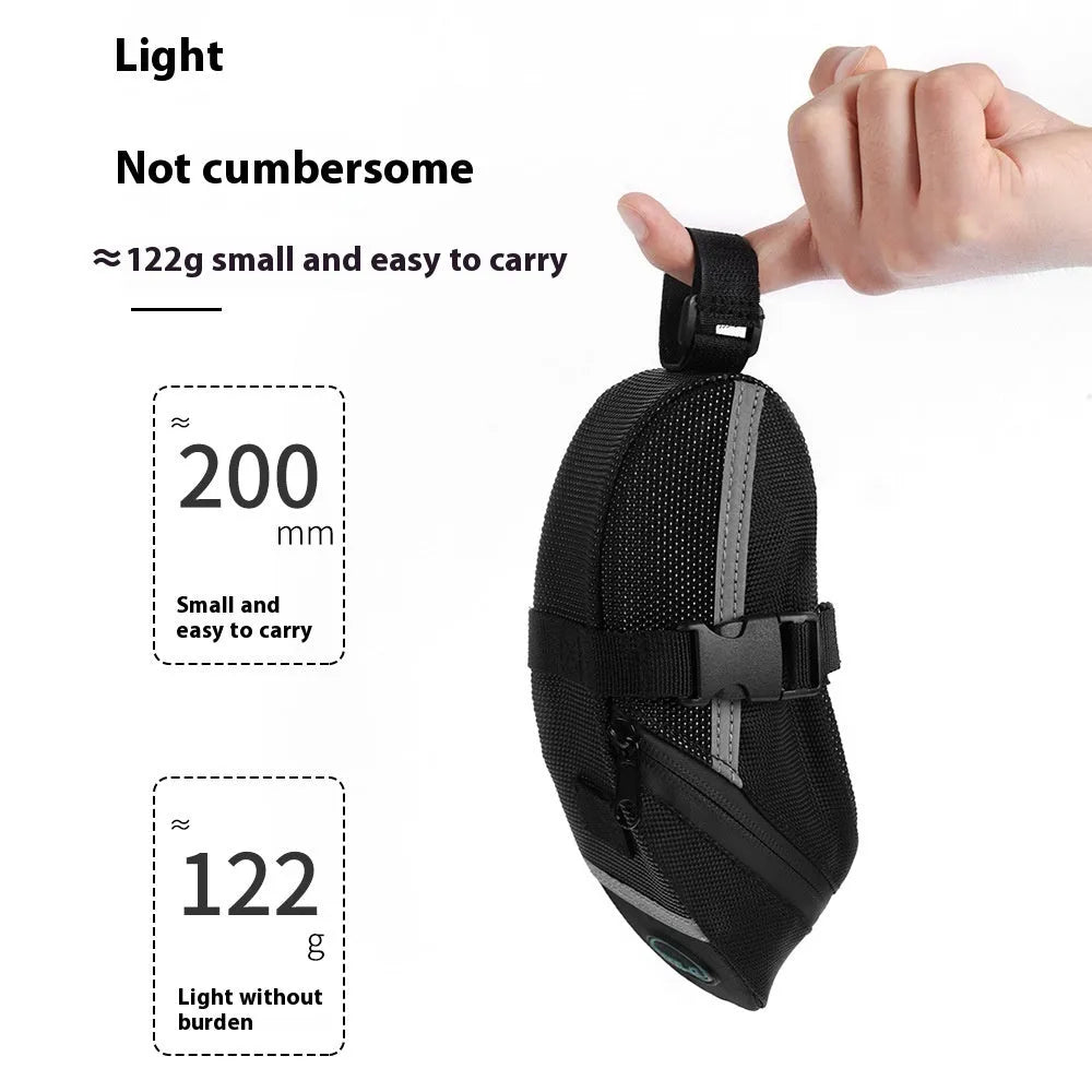 Black cycling quick release saddle bag with polyester construction mounted under bicycle saddle