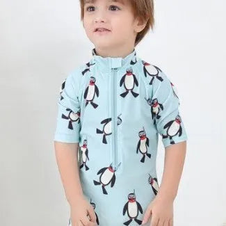 Boy's penguin print long sleeve swimsuit with matching swimming cap for beach sun protection