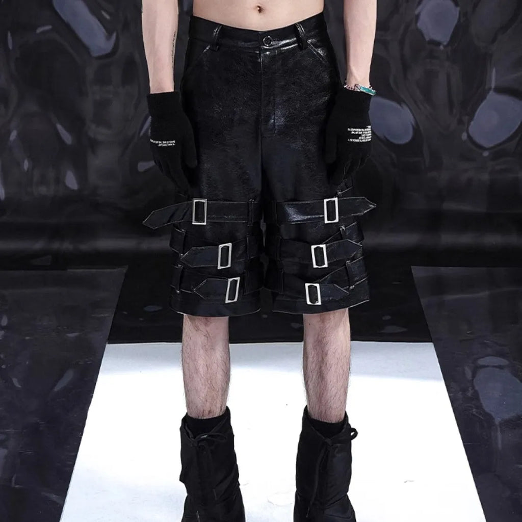 Men's black PU leather cropped shorts with medium-low waist, showing polycarbaminate fibre construction and contemporary design