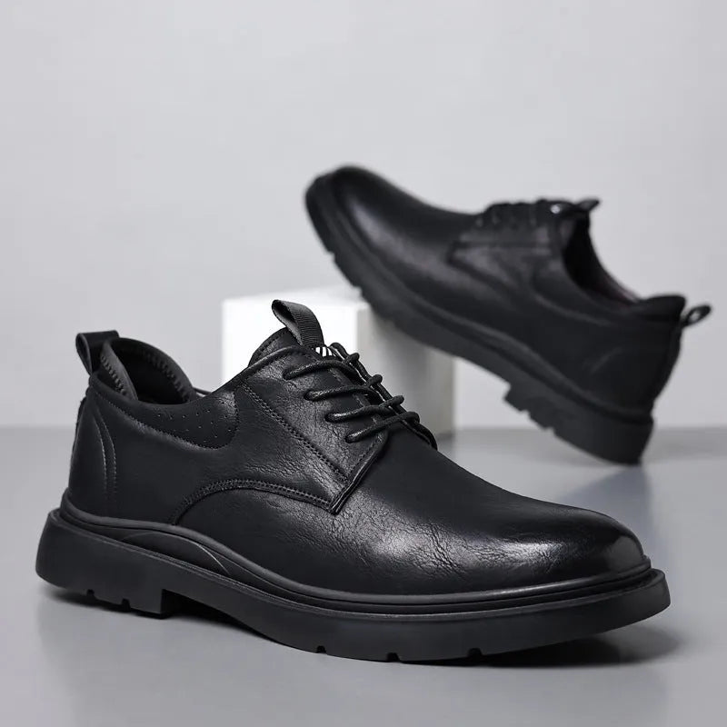 Men's black and brown leather business shoes with rubber soles and sewing line detail