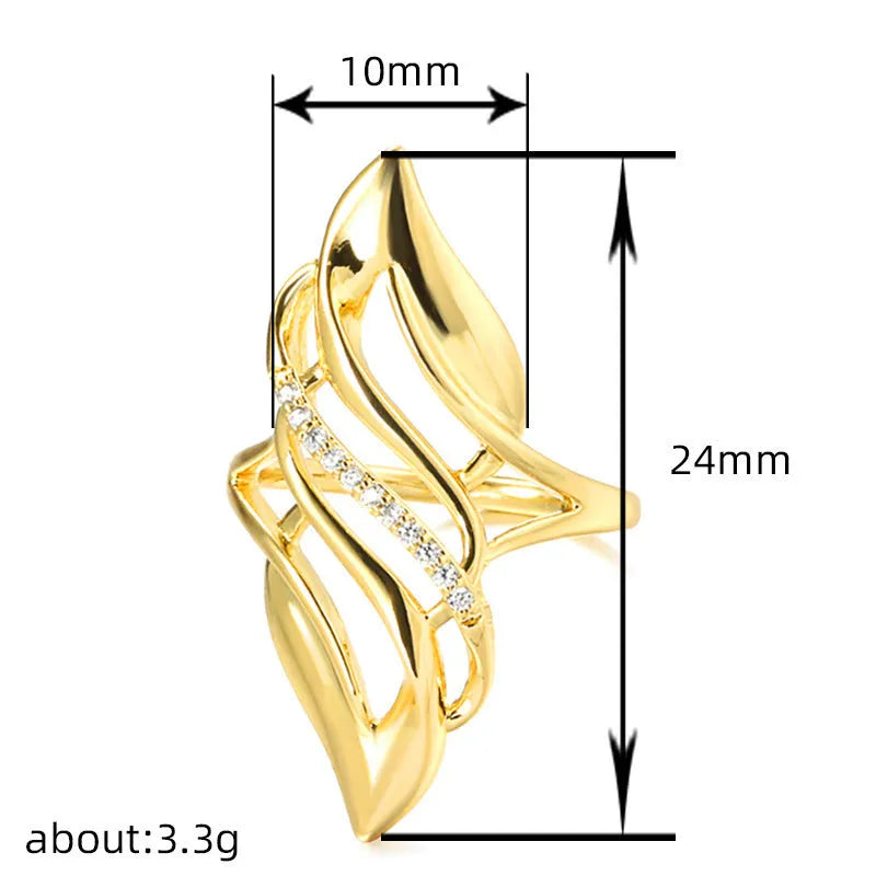 Women's exaggerated curve ring in Q611 gold colour on copper with casual styling
