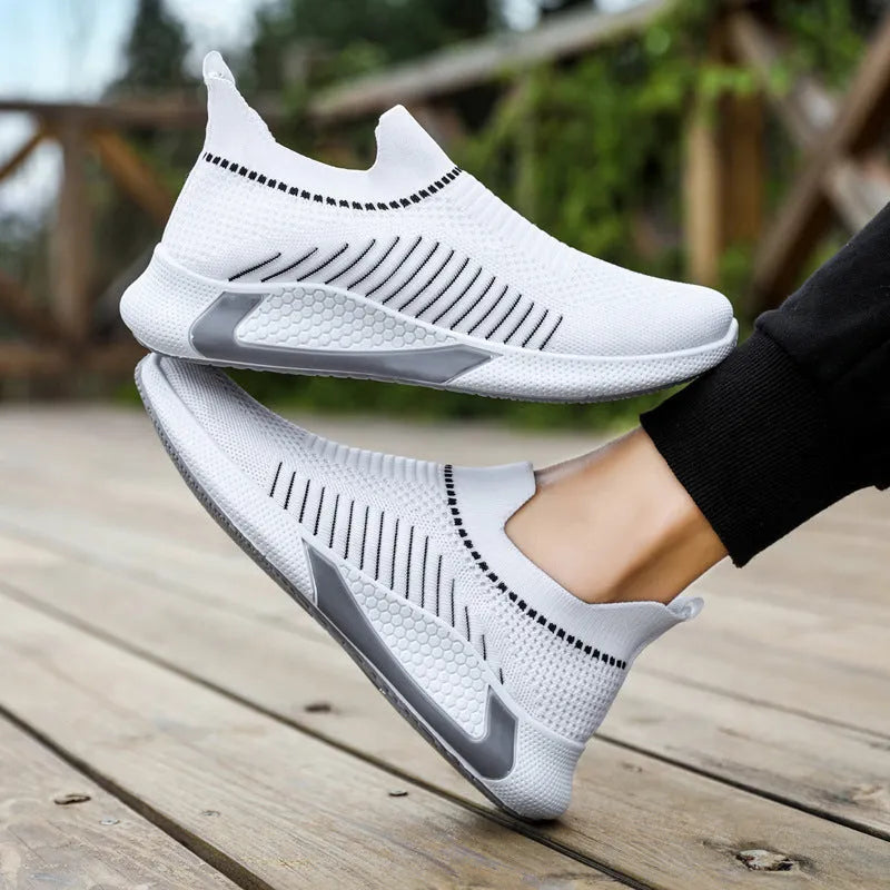 Men's mesh sock shoes with striped design, Flyknit upper, and plastic sole in black-white colour, size 42