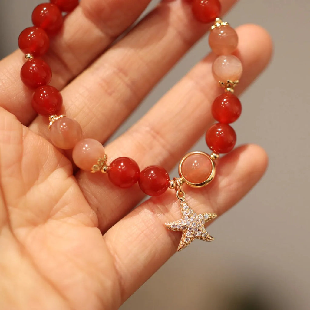 Handmade women's 8mm red agate and sunstone bracelet with xiangyun patterns in ethnic style