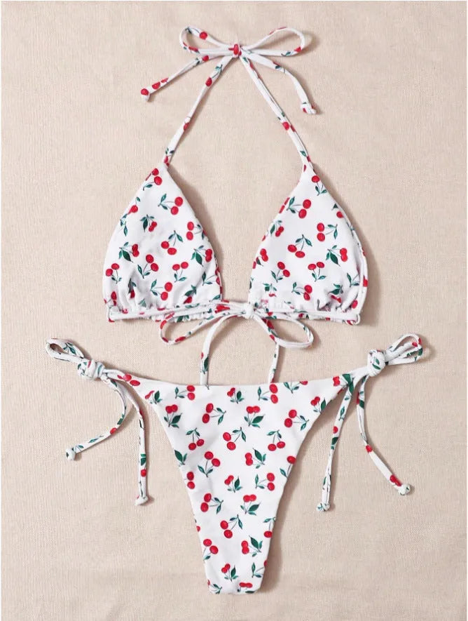 Solid colour women's halter bikini set with briefs and backless design.