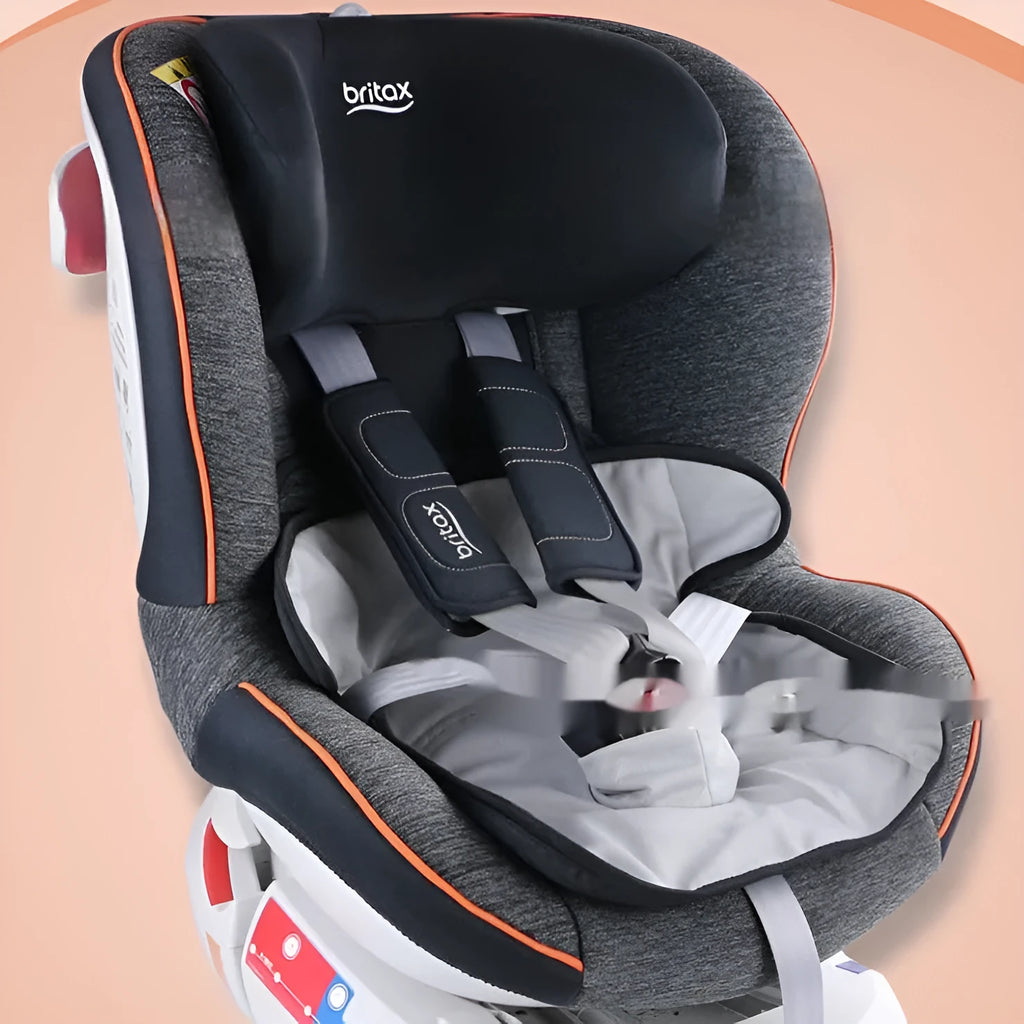 Alien-shaped grey car seat protective pad with urine-separation layer on a car seat.
