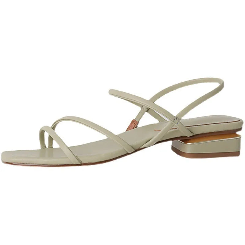Women's flat strap gladiator sandals with square toe and adjustable ankle ties in beige.