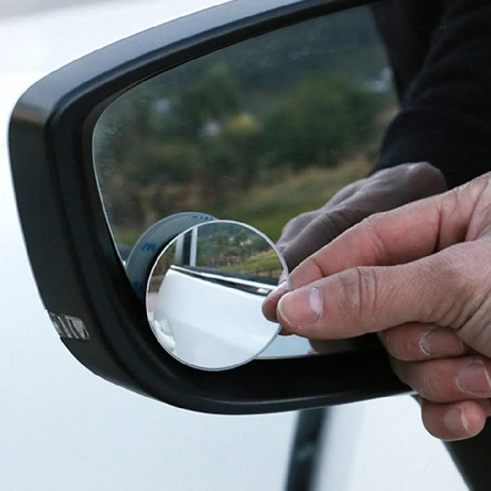 Silver 5cm round convex blind spot mirror with 360-degree adjustable mount for car rearview mirror.