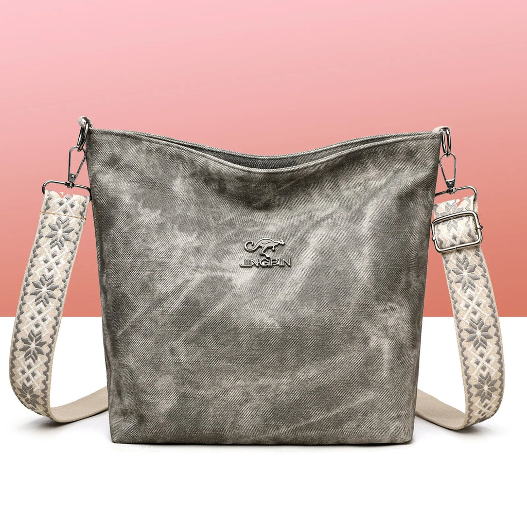 Soft PU large capacity crossbody bag in pink, grey, or yellow with an adjustable shoulder strap.
